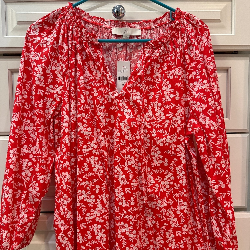 Red floral blouse